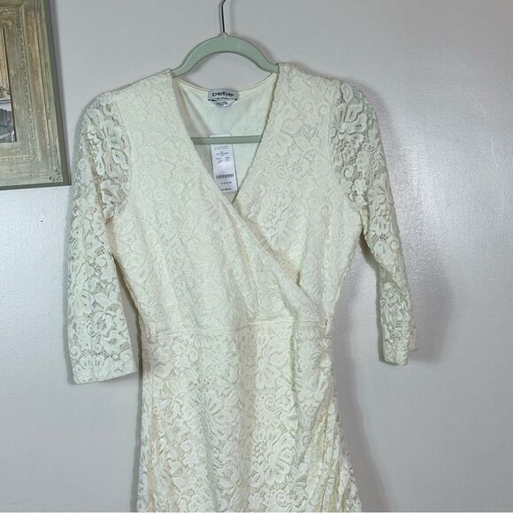 Bebe Cream Ruched Wrap Dress with V-Neck - Picture 2 of 6